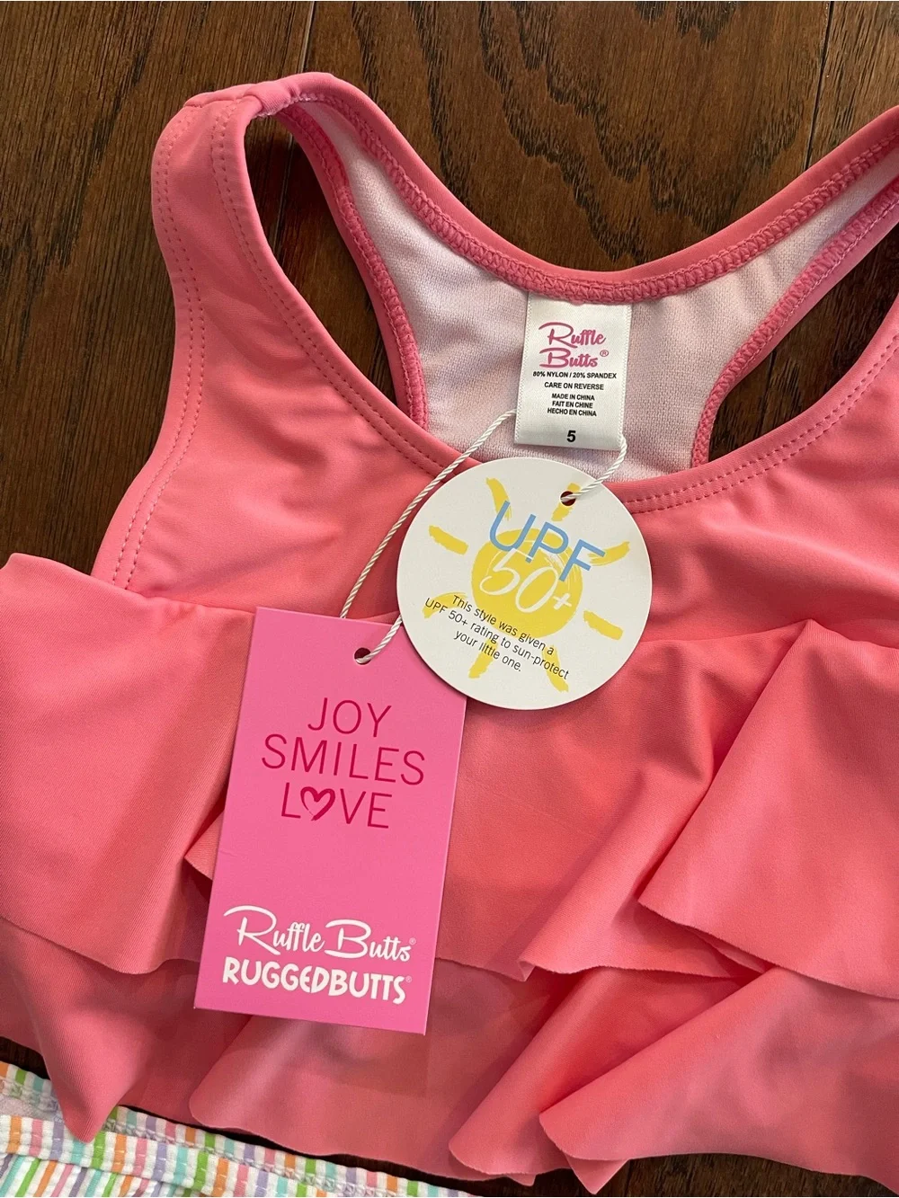 Ruffle Butts Pink Ruffled Tankini Top with Rainbow Striped Trim
